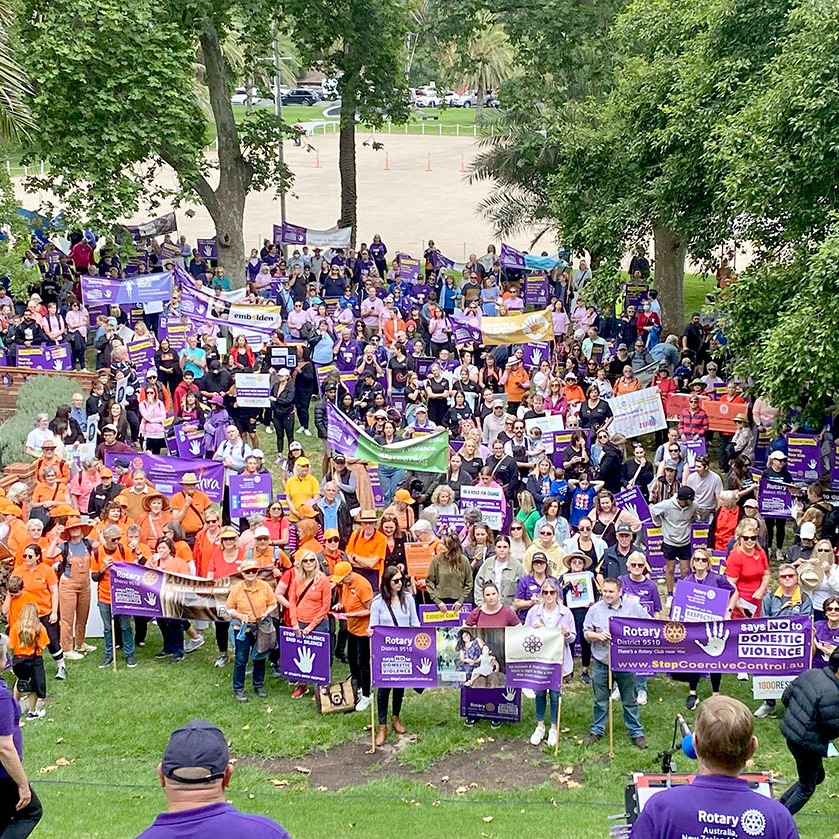 People gather in the Pioneer Women's Memorial Garden to hear inspiring speakers.